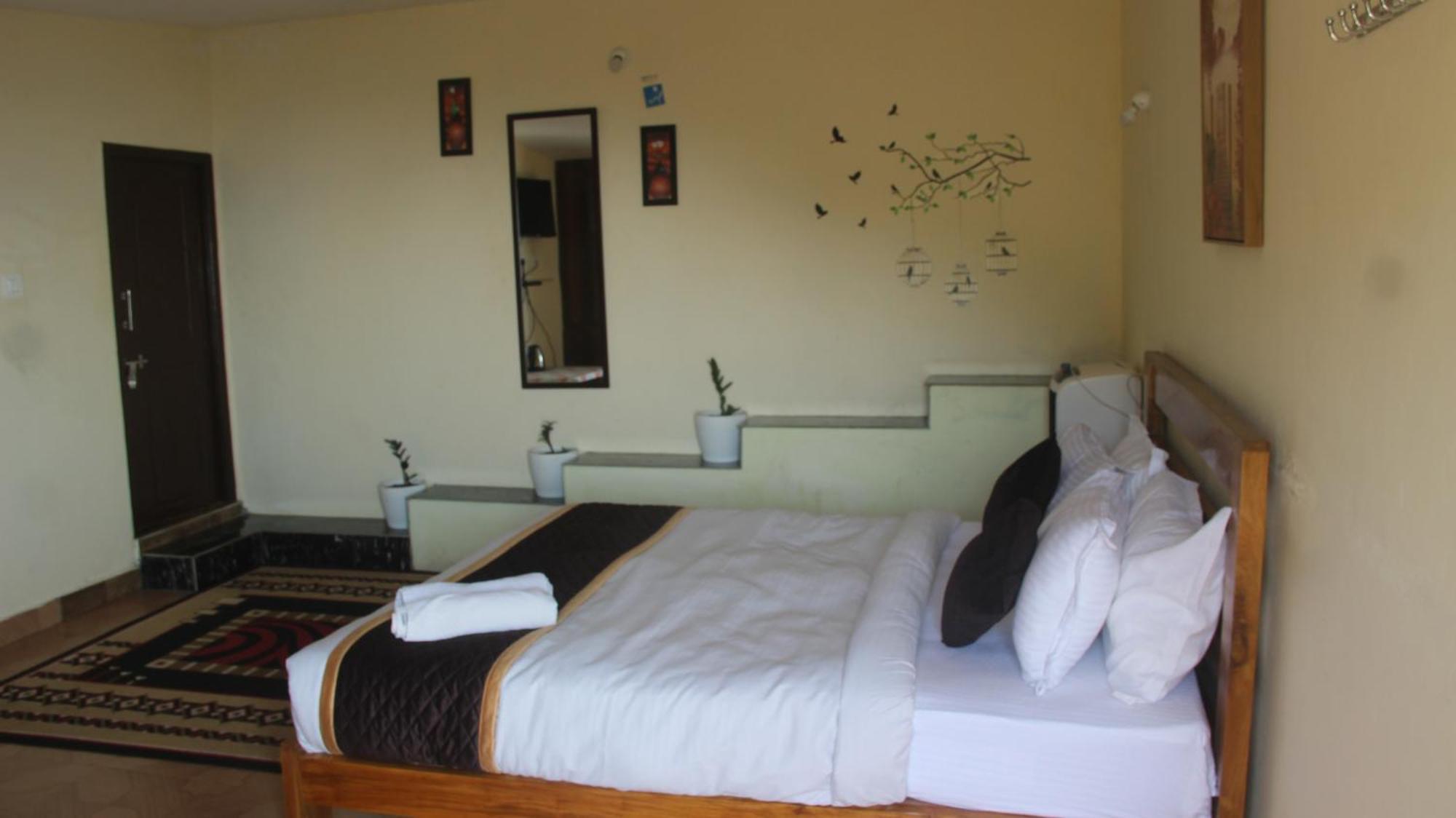 Kollanoor Guest House มาดิเครี ห้อง รูปภาพ